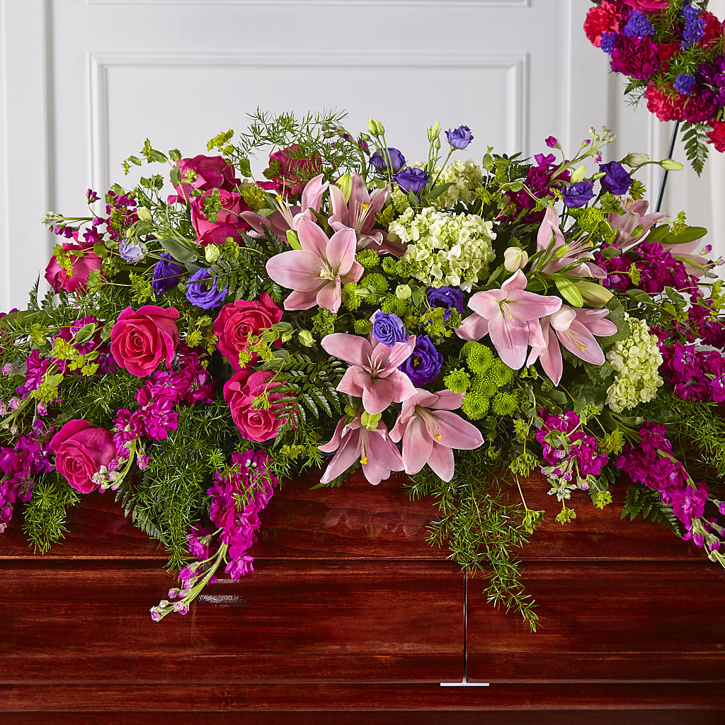 Radiant Tribute Casket Spray – CHET & LEONA'S FLORAL SHOP, Milwaukee WI